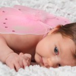 Baby als Schmetterling