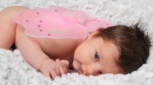 Baby als Schmetterling